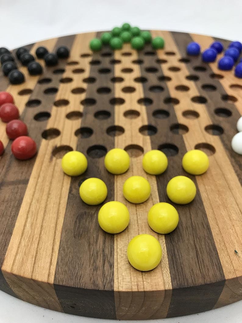 Wooden Chinese Checkers - Aggravate Board Game. Puzzle game